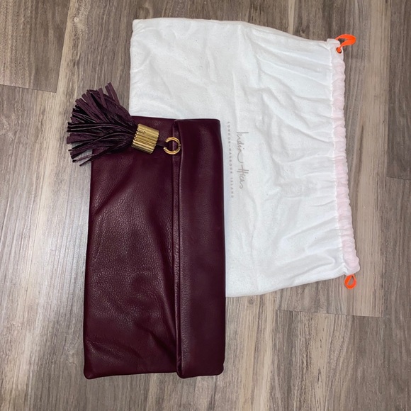 India Hicks Leather Tassel Clutch
